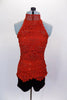 Burnt orange crochet lace halter top ties at neck & has attached camisole lining covered in Swarovski crystals. Comes with maroon velvet shorts & chiffon shawl. Front