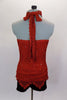 Burnt orange crochet lace halter top ties at neck & has attached camisole lining covered in Swarovski crystals. Comes with maroon velvet shorts & chiffon shawl. Back