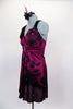 Silk magenta baby-doll dress has  black flower pattern with crystals.  Has wide straps with chiffon roses on shoulder. Comes with black shorts & hair accessory. Left side