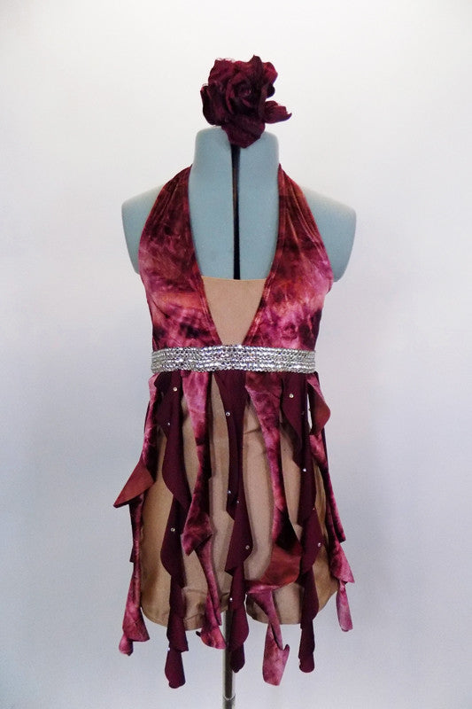 Rose & maroon crystaled fabric twists form cascading skirt originating from crystaled empire waist of nude unitard. Triangle velvet halter collar has nude bust insert. Comes with maroon floral hair accessory. Front
