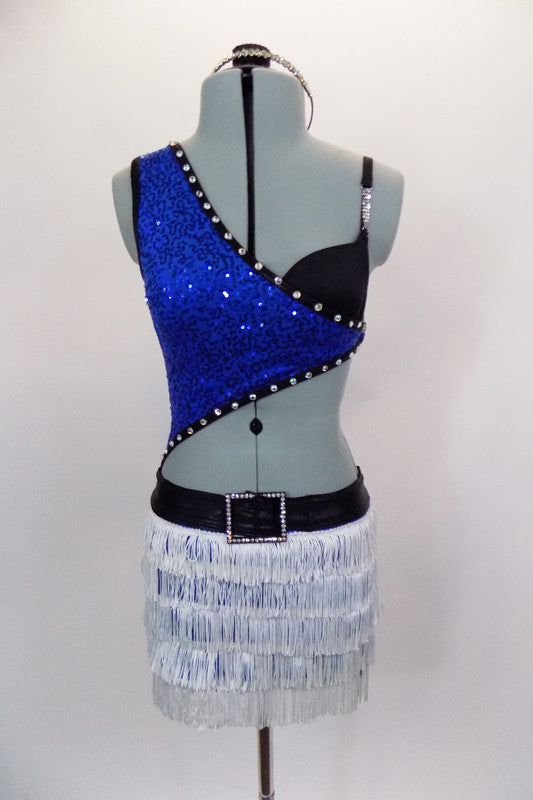 Asymmetrical blue sequined top with black bra is lined with crystals & is connected at the side by a crystal ring. Bottom is an attached white fringed skirt with crystal buckle accent. Has matching hair accessory. Front
