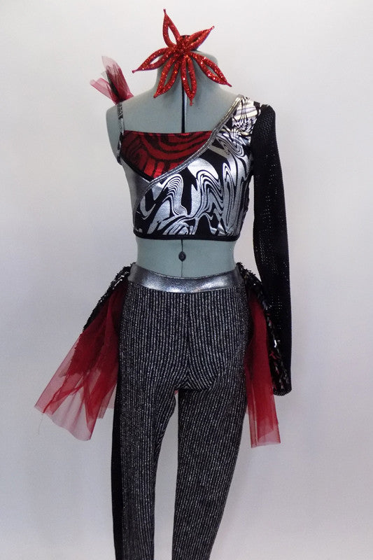 2-piece costume has single mesh sleeved crop top with black-silver-red abstract design Accompanying silver and black pinstripe legging has sequin & tulle bustle. Comes with large red hair accessory. Front