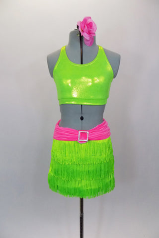 Neon green fringe skirt has pink gathered waistband with large crystal buckle. Comes with matching green racerback half-top & hair accessory. Front
