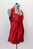 Red satin baby-doll top has padded bust & ties at neck. Pleated bust is covered extensively with Swarovski crystals. Comes with black briefs & hair accessory. Side
