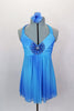 Blue chiffon halter baby-doll top has large jeweled applique at front center over pleated bust area & ties at neck. Comes with black shorts and hair accessory. Front
