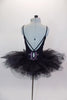 Black leotard with open loop back has had painted, purple designs &  crystals along back & torso. Comes with pull on black tutu & floral hair accessory. Back