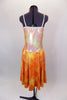 Orange & yellow dress has knee length flowing skirt with silver swirl detail. The bodice is an iridescent camisole with silver edging. Comes with hair accessory. Back