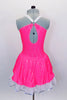 Neon pink dress has white spandex belt with crystal buckle. Has white ruffled underskirt for volume. Keyhole back attaches by a ring. Comes with hair accessory. Back