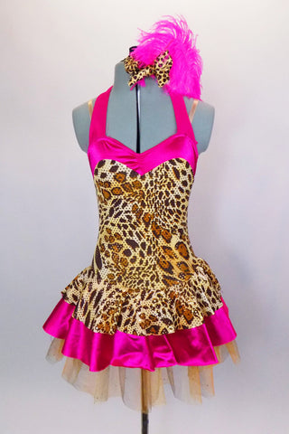 Hot pink satin & cheetah print halter-neck leotard dress is embellished with gold sequins. Gold glitter tulle sits beneath skirt. Has matching hair accessory. Front