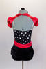 Leotard has black ruffled panty &  black bodice with white polka dots, ruffle & red belt with crystal buckle. Comes with red satin mini-shrug & hair accessory. Back