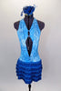 Aqua open front leotard dress has turquoise swirls. The open back halter bodice has front lapelled panels and crystaled back straps. Skirt is five layers of turquoise fringe. Comes with hair accessory. Front