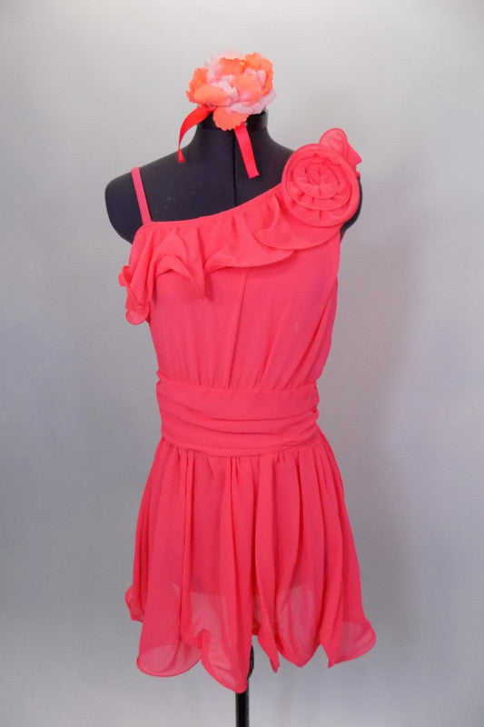 Coral chiffon lyrical dress has single shoulder & gathered waistband. The dress has ruffles along upper bodice. Comes with matching hair accessory. Front