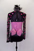 Three piece costume has pink & black corset top with pink hearts & bow at back. The sheer black shrug also has pink hearts. Comes with feather hair accessory. Back