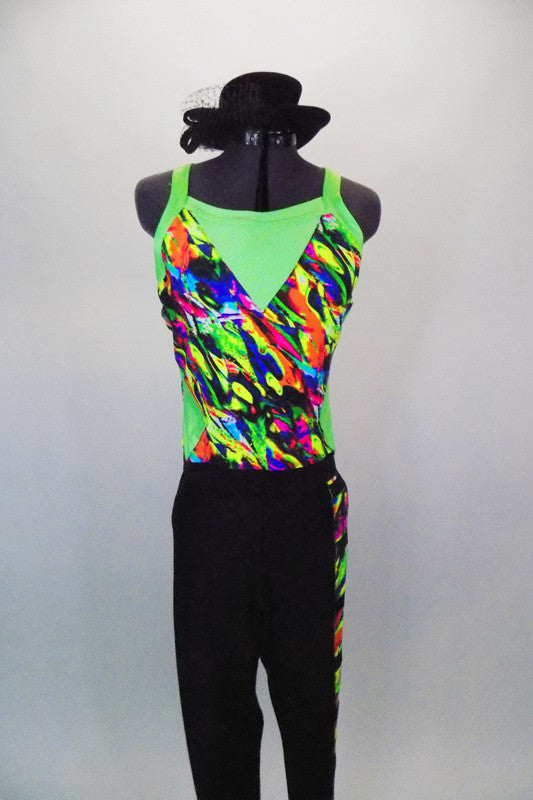 Full unitard has green cross-back tank with colored pattern. The bottom is black  with colored ladder pattern down one leg. Comes with black hat accessory. Front