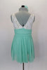 Empire waist dress has ivory lace bodice & shirred cummerbund with feather accent. Skirt is layers of mint green glitter mesh. Has matching hair accessory. Back