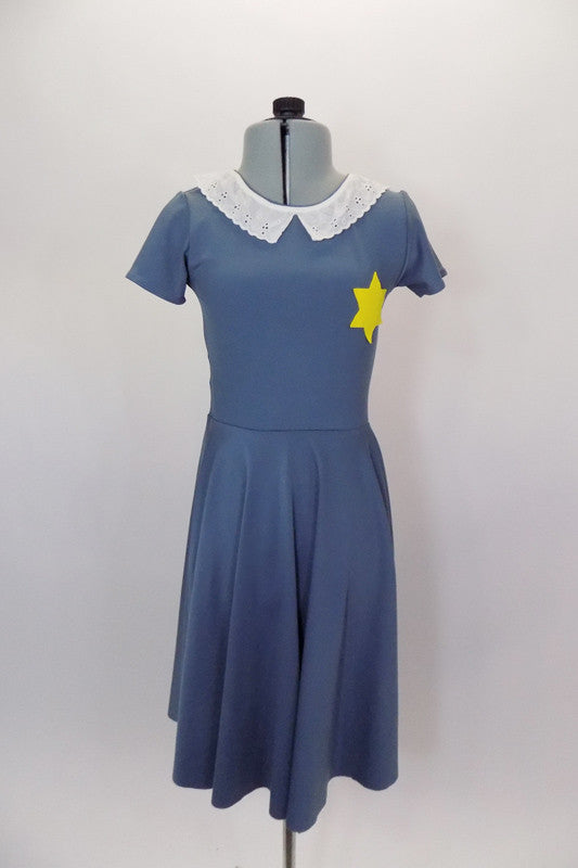 Grey stretch dress has white eyelet collar & separate matching panties. The skirt portion comes to mid-calf & there is a yellow Star of David on the left bust. Front