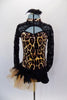 Animal print leotard has keyhole back, black sequined lace sleeves. Right hip had gold tulle and feather bustle. Comes with matching feather hair accessory. Front