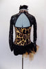 Animal print leotard has keyhole back, black sequined lace sleeves. Right hip had gold tulle and feather bustle. Comes with matching feather hair accessory. Back