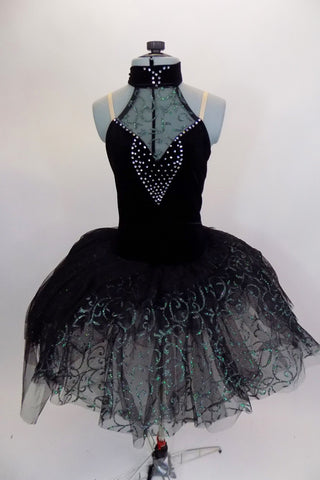 Black tutu has velvet halter bodice with high velvet neck and green swirl lace & crystals. Black tulle has overlay of green swirled lace. Comes with eye mask. Front