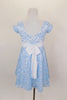 Fully lined pale blue sequined lace dress has cap sleeves & white  sash that ties in bow at back. Comes with matching sequined hair accessory. Back