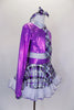 Crystal covered purple metallic half-top has keyhole back, white glitter collar & attached tartan neck tie. The matching tartan skirt has petticoat & ruffle.  Comes with tartan socks and headband. Side