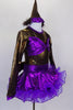 Brown shiny leotard with keyhole back has large purple bow bust. Purple skirt has curly ruffle edge & large bow at back with tail. Has pointy party hat with fuzzy ears.  Side
