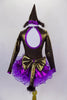 Brown shiny leotard with keyhole back has large purple bow bust. Purple skirt has curly ruffle edge & large bow at back with tail. Has pointy party hat with fuzzy ears. Back