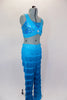 2-piece costume has layers of fringe covered pants in deepening shades of turquoise. Sequined half-top has bands that cross over the front with jewel accent. Comes with crystal hair barrette. Side