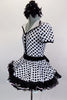 Black-white polka dot leotard has keyhole back, lapel collar & pearl buttons. Skirt has black petticoat with large back bow. Comes with gloves & hair accessory. Side