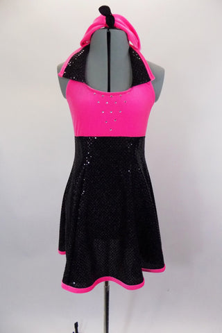 Empire waist, black sequin dress has neon pink velvet halter bodice with black sequin lapels, crystal accented front as well as pink binding & matching headband. Front