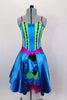 Turquoise leotard has satin gathered skirt with yellow lace on bodice & tulle underlay below bustle. Separate satin skirt with magnetic clasp has tulle ruffles. Comes with feather hair accessory.  Front with skirt