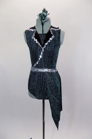 Semi sheer black leotard has keyhole back, swirls of metallic green & black velvet lapels with silver edging. Comes with angled side skirt, silver sequined belt & hair accessory. Front