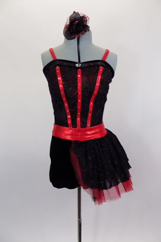 Black, sequined sheer bustier bodice with red stripe accents sits over red metallic bra, Attached black shorts have red waistband & tulle/mesh side bustle. Comes with matching hair accessory. Front