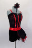 Black, sequined sheer bustier bodice with red stripe accents sits over red metallic bra, Attached black shorts have red waistband & tulle/mesh side bustle. Comes with matching hair accessory. Right side