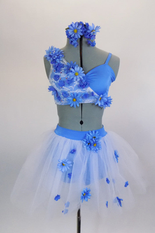 Blue 2-piece costume has unique bra covered on one side with white lace & cascaded in blue daisies & crystals. Skirt is layered white tulle with daisies. Comes with matching hair accessories. Front