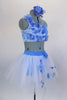 Blue 2-piece costume has unique bra covered on one side with white lace & cascaded in blue daisies & crystals. Skirt is layered white tulle with daisies. Comes with matching hair accessories. Right side