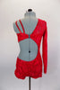 Sequined red lace one sleeve, short unitard has nude base, center cut-out & silver design. Left side opens around to the back. Has crystal hair barrette. Back