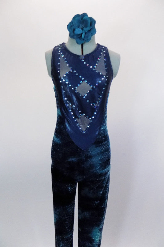 Velvet full unitard has shades of blues & greens. Bodice is  sheer blue mesh with crystaled straps. Back is V-shaped mesh & crystals. Comes with hair accessory. Front