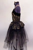 Gold camisole leotard with black sequined lace has wide black velvet deep plunge center with nude insert. Matching overlay sits on long black tulle skirt.  Comes with hair accessory. Side