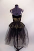 Gold camisole leotard with black sequined lace has wide black velvet deep plunge center with nude insert. Matching overlay sits on long black tulle skirt.  Comes with hair accessory. Back