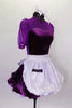 Purple velvet dress has sweetheart neckline with mesh upper, sleeves & white fluffy petticoat. The dress comes with a shiny white apron with pockets & hair bow. Right side