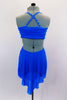Bright blue mesh dress has crystaled straps and gathered, lined cross-over bust with  crystal brooch. Bust is attached to skirt gathered at front & open at back. Comes with crystal barrette. Back