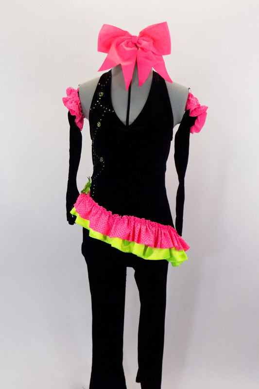 2-piece black velvet costume has asymmetrical top with pink & green ruffles & crystals. Comes with black velvet pants & long velvet gloves with pink ruffle.  Comes with bow hair accessory. Front