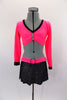 Neon pink velvet, long sleeved half top has crystalled pinch front. The black sparkle skirt has attached panty & pink velvet waistband with crystal buckle. Comes with hair accessory. Front