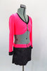 Neon pink velvet, long sleeved half top has crystalled pinch front. The black sparkle skirt has attached panty & pink velvet waistband with crystal buckle. Comes with hair accessory. Side