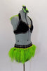 2-piece costume has black velvet bra, with crystals & green ostrich feather halter collar. Black velvet brief has green ostrich feathers & crystaled waistband. Comes with feather hair accessory. Side