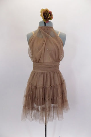 Taupe mesh lyrical dress is camisole style short unitard base with crystals at bust. Sheer draping on bodice attaches at high collar. Skirt is layers of ruffled mesh & cummerbund waist. Comes with rose hair accessory. Front