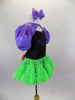 Black bodice is scattered with crystals & has attached skirt with layers of black and lime green ruffled mesh & pink bow. Comes with purple shrug & hair bow. Side