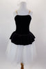 Black & white romantic tutu dress has skirt in layers of white tulle. The black velvet peplum bodice has white center panel with applique & gold braid accent. Comes with matching hair accessory. Back