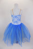 Ivory lace and gold applique sits over top of a shiny blue leotard base with nude straps and nude center insert. Gold and blue crystal tulle, make up the attached romantic tutu. Comes with hair accessory. Back